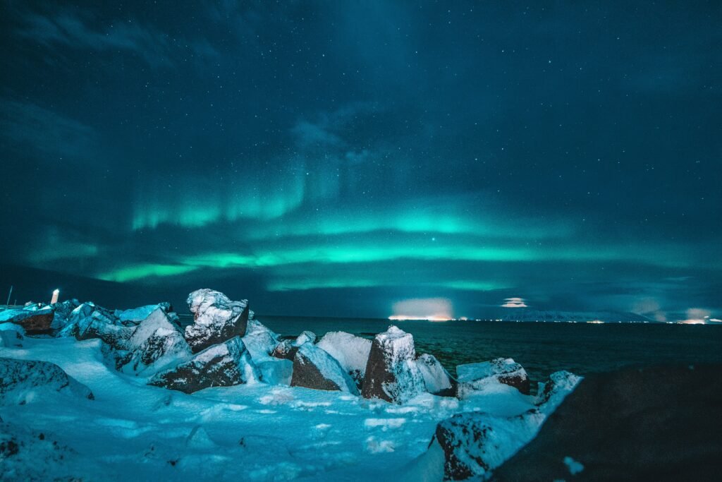 northern lights in iceland illustrating Best Winter Vacation Spots: Affordable Destinations for Families in 2024