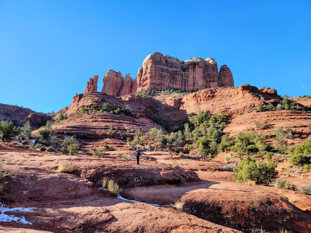 young boy climbing cathedral rock