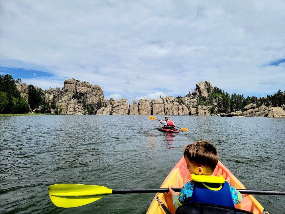 cooper kayaking at sylvan lake